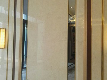 石材與不銹鋼裝飾的背景墻