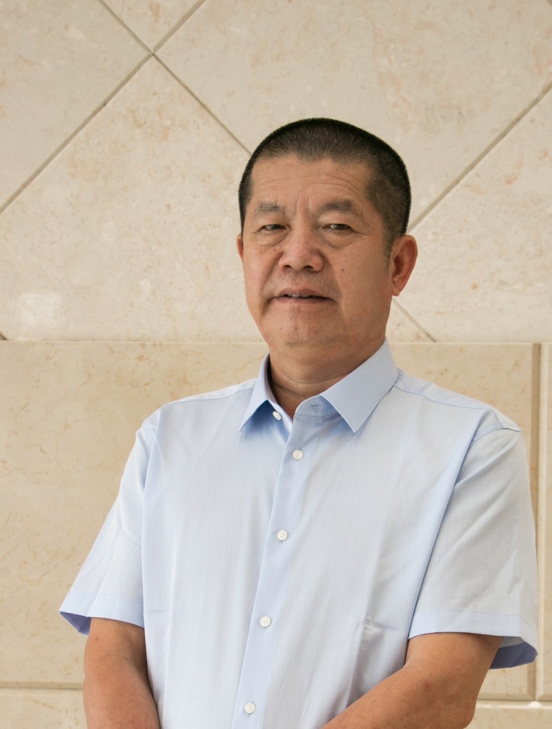 光明石材董事長黃明經(jīng)