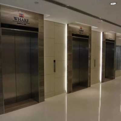 咖啡木紋大理石電梯門套應用